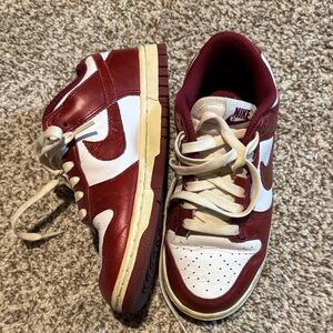 Nike dunks in Maroon and White